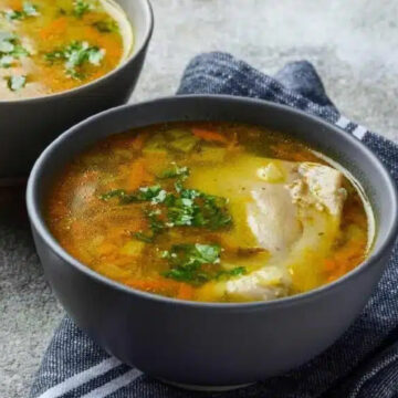 Chicken broth in a bowl.