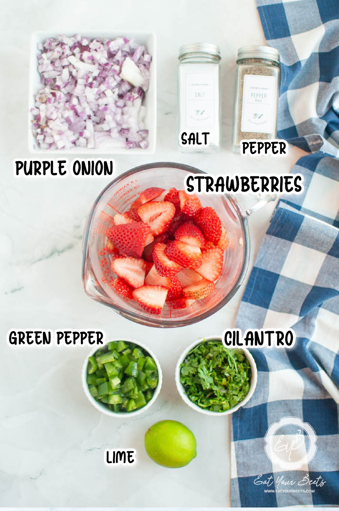 Ingredients to make strawberry jalapeno salsa.