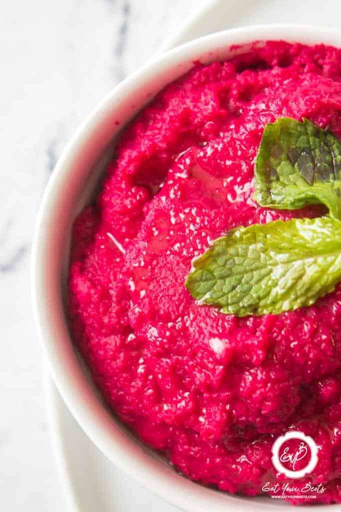Beetroot hummus in a bowl.