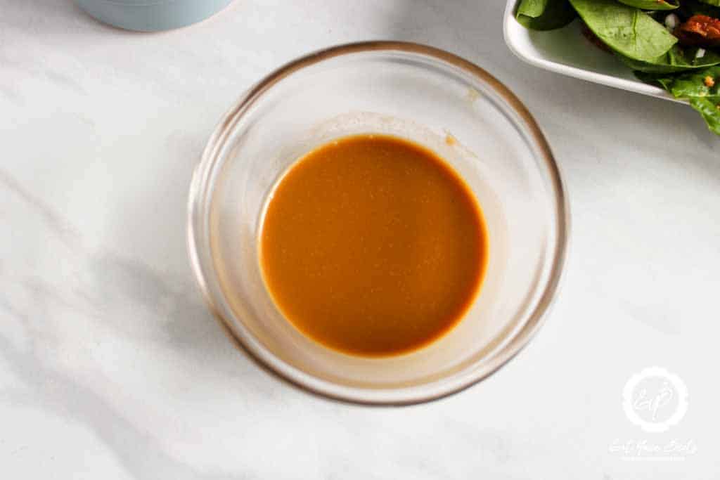 Balsamic vinegar dressing in a bowl.