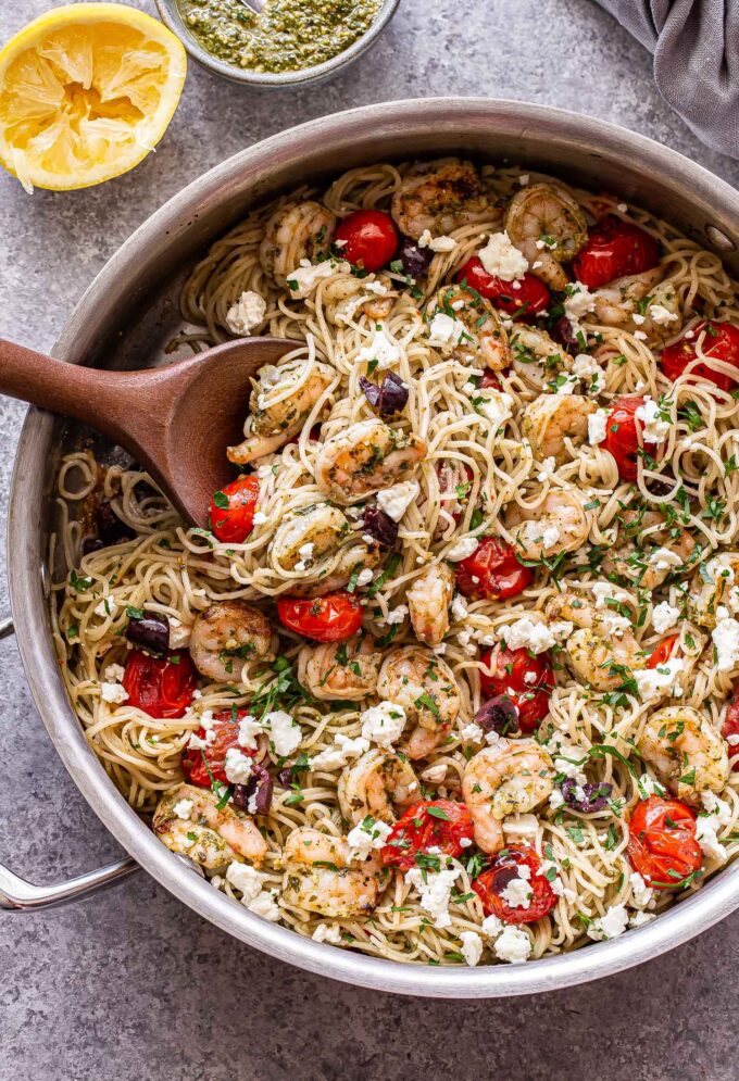 Grilled shrimp pesto pasta in a pot.