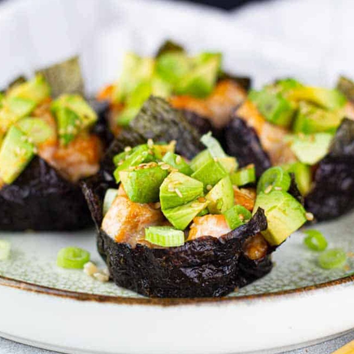Baked Salmon Cauliflower Rice Sushi on a plate. 