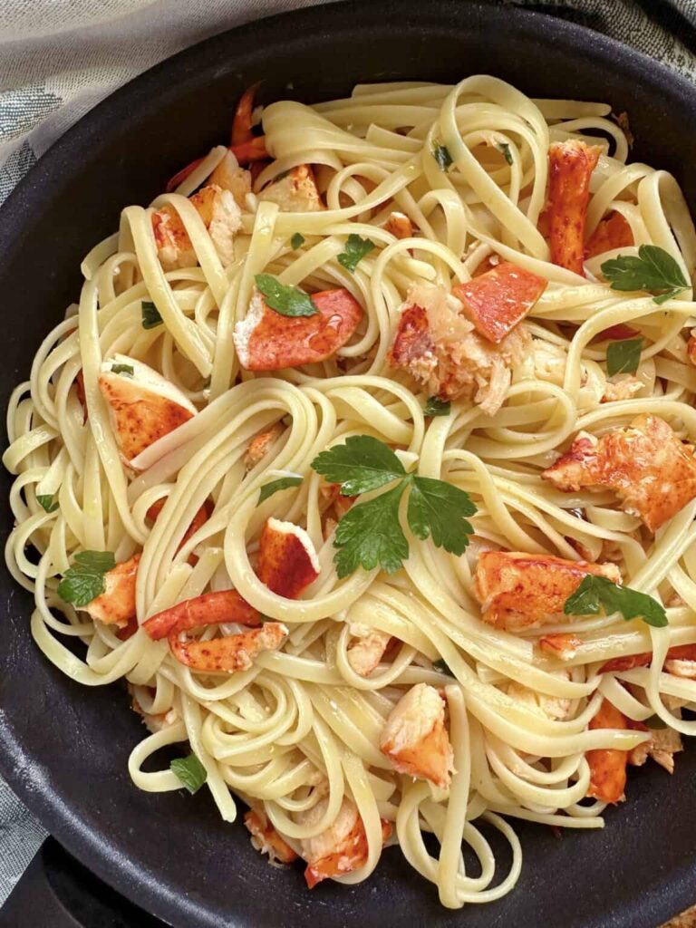 Shrimp noodles in a skillet.