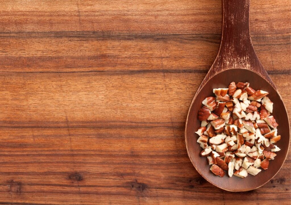 Pecans On A Wooden Spoon