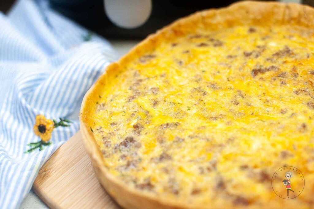 Sausage quiche on a wooden board