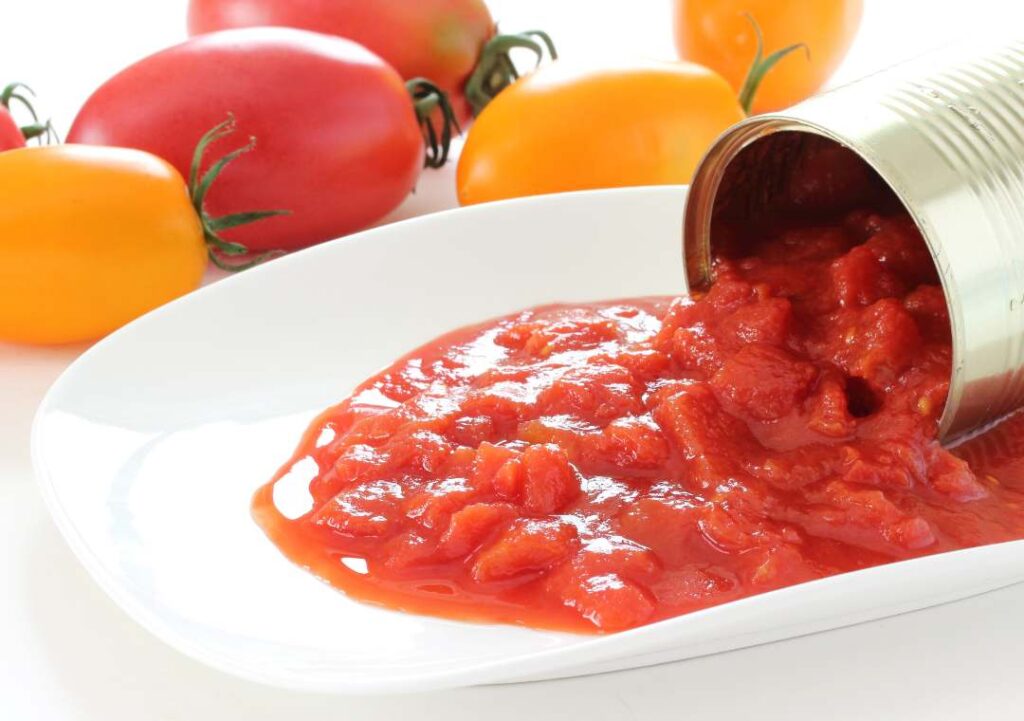 canned tomatoes in a plate.