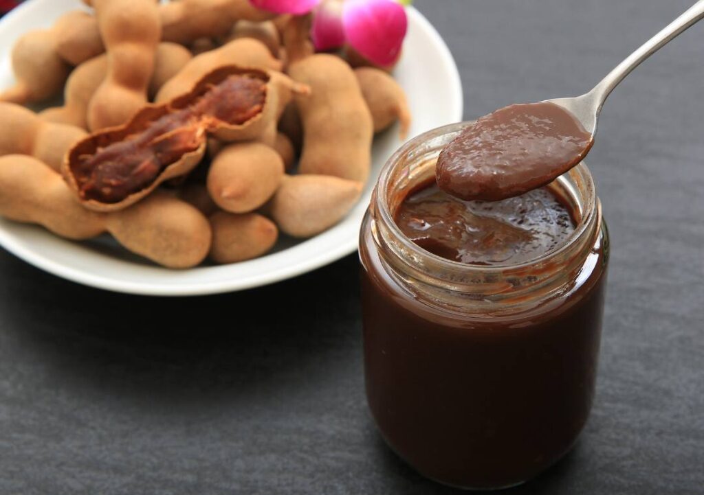 tamarind paste in a spoon