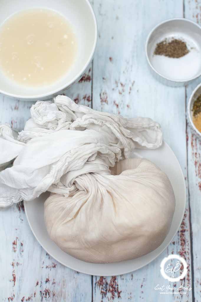 squeezing water out of cauliflower.