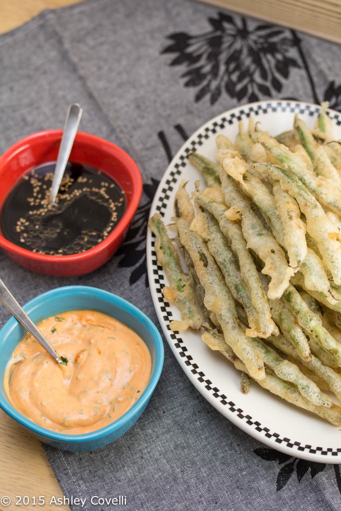 Cooked beans served with sauces.