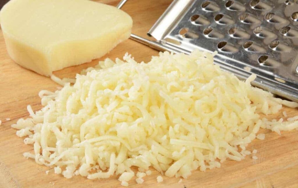 Grated mozzarella cheese.
