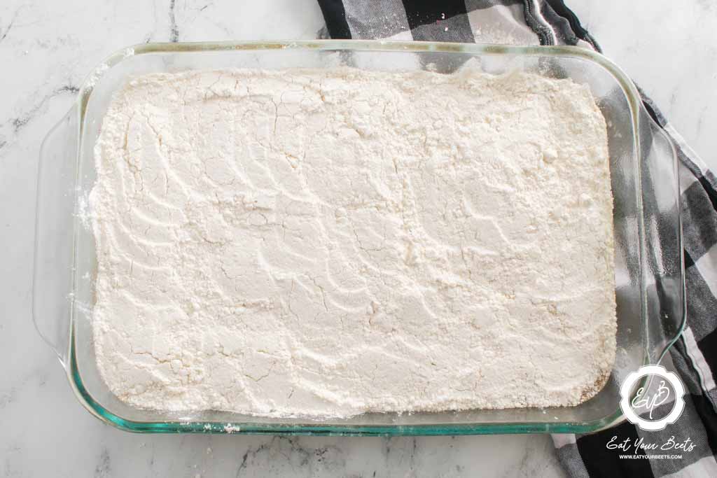 pumpkin crunch cake layered with whipped topping.