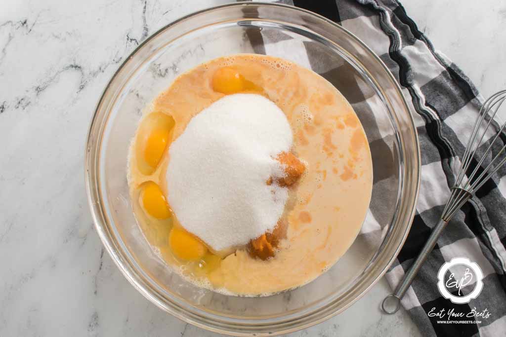 pumpkin crunch cake ingredients in a bowl.