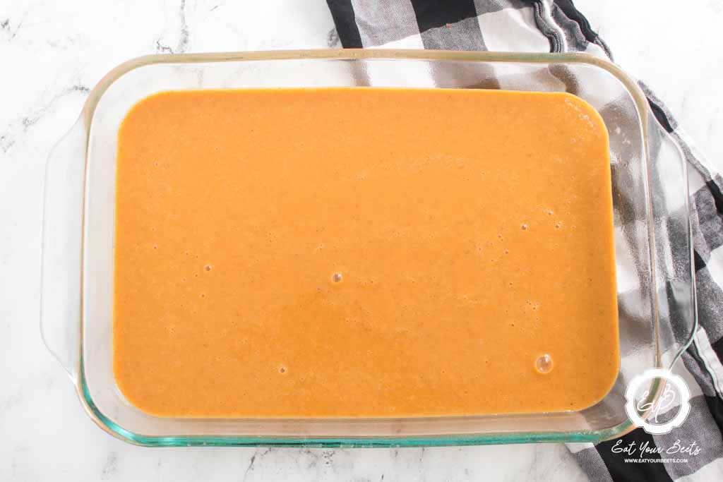 pumpkin puree layer on pumpkin crunch cake.