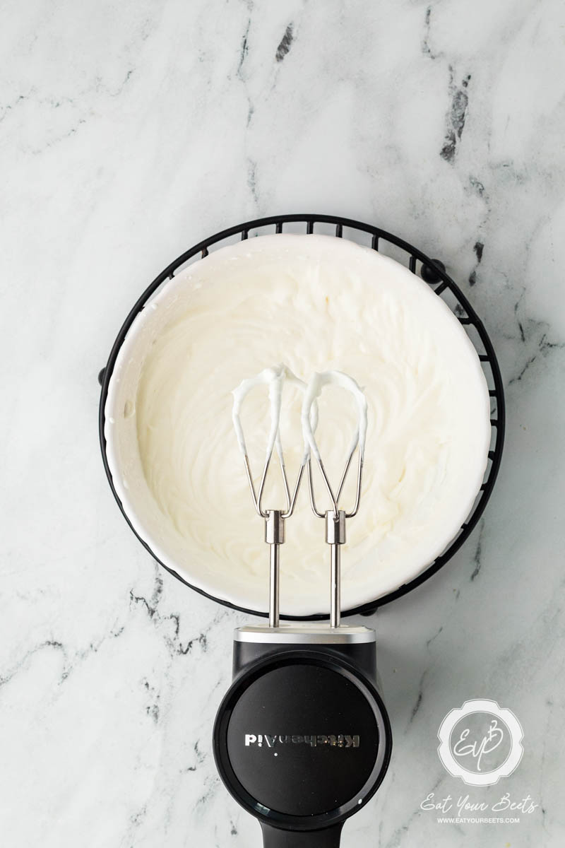 Heavy cream being beaten.