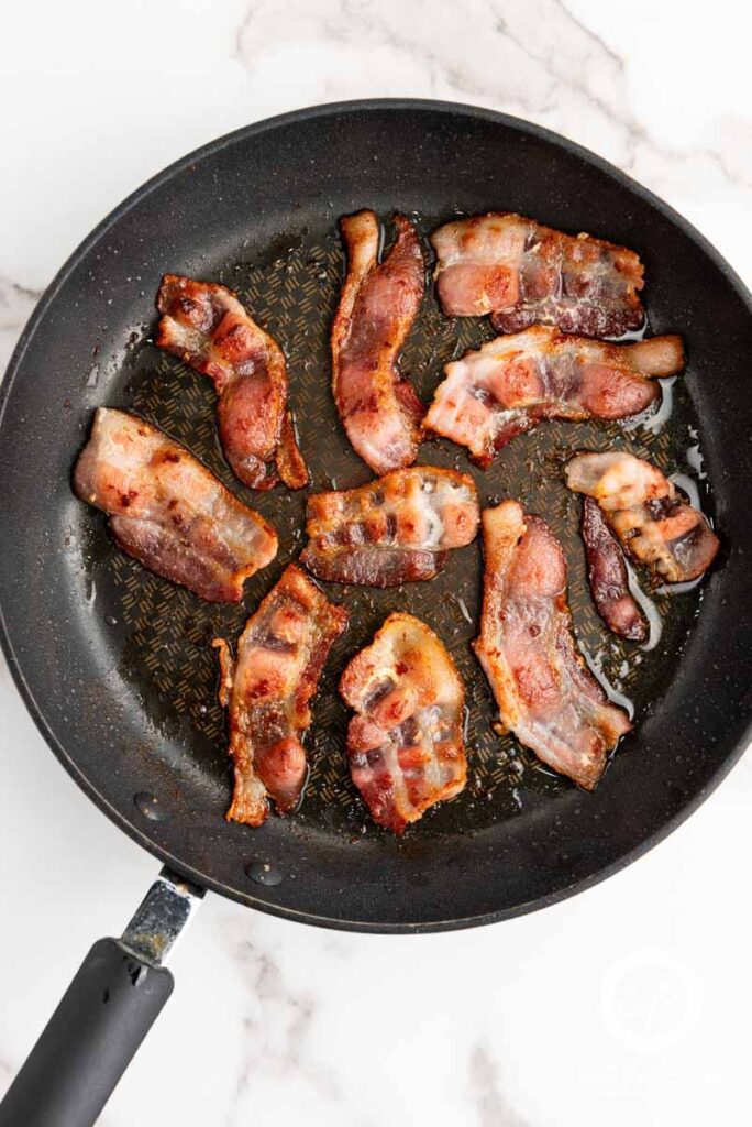 bacon in a skillet.