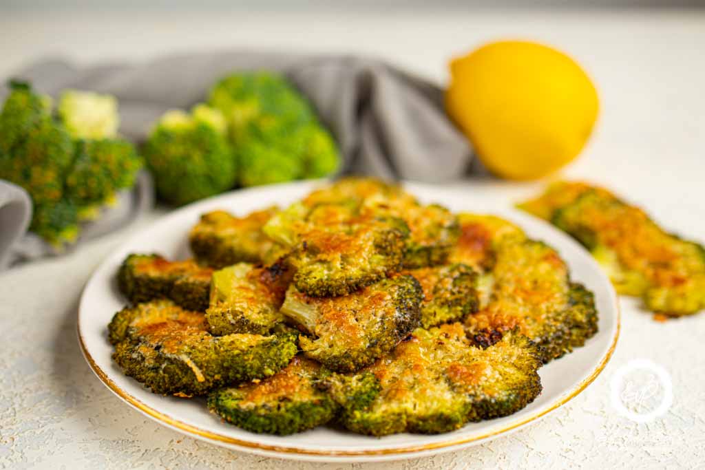 Smashed broccoli parmesan chips in a plate ready to eat.