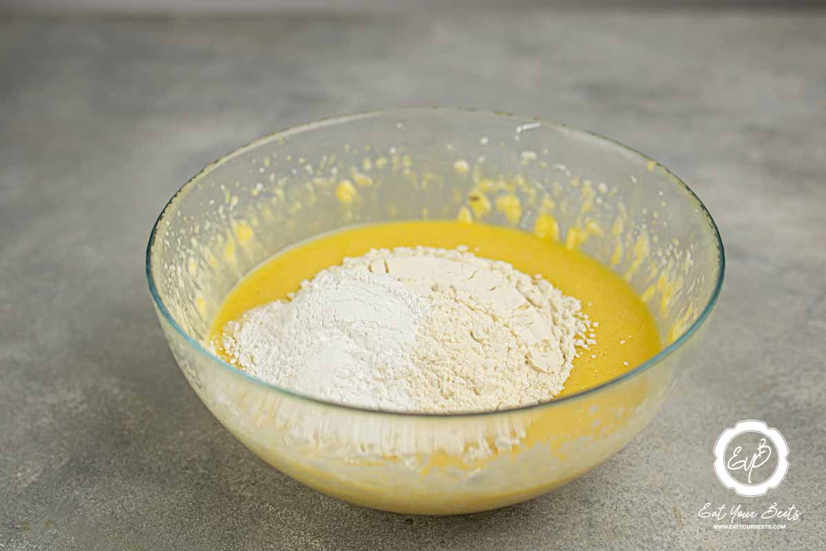 Flour, protein powder, and baking powder in eggs mixture.