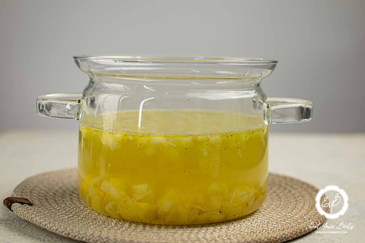 Boiling vegetables in a pot.