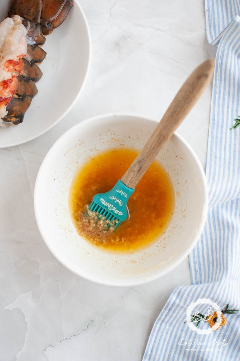 melted butter, minced garlic, paprika and lemon juice.