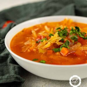 Zesty Cabbage Soup in a white bowl.