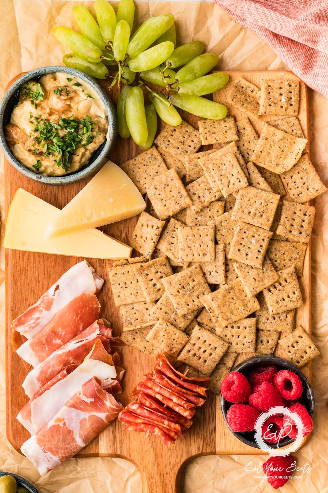 Wholewheat Einkorn Crackers on a charcuterie board.
