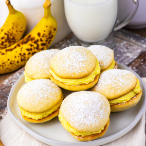 Banana Whoopie Pies on a white plate.