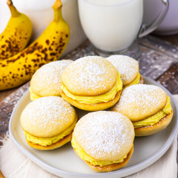 Banana Whoopie Pies on a white plate.