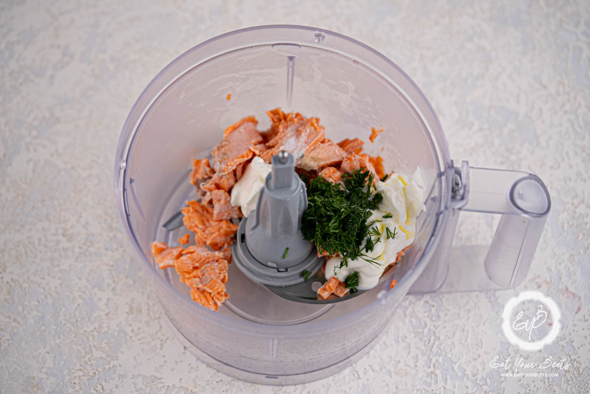 Ingredients for lemon dill salmon mousse in food processor.
