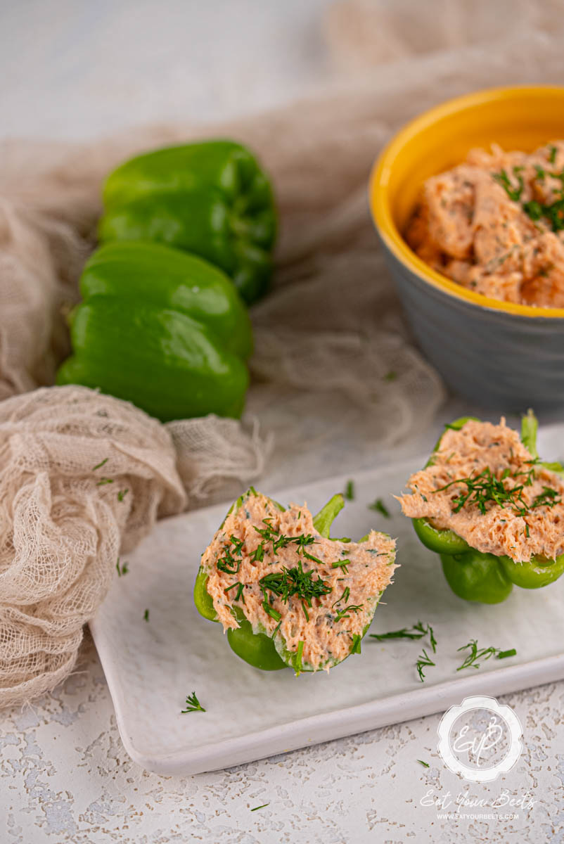 Lemon dill salmon mousse filled in mini peppers, ready to serve.