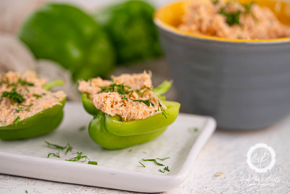 Lemon dill salmon mousse filled in mini peppers, ready to serve.