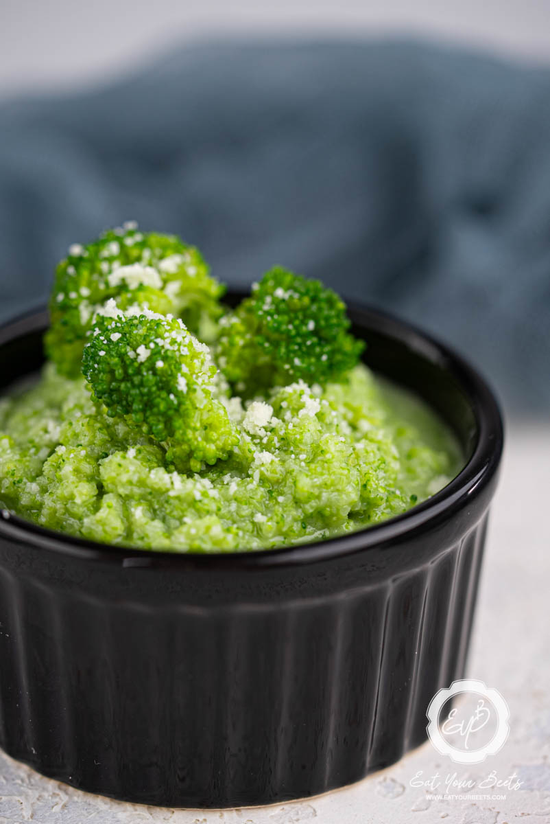Pureed broccoli in a ramekin.